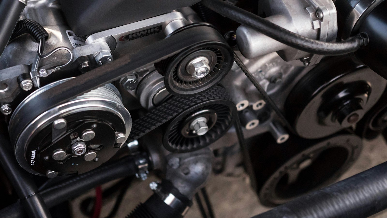Engine bay close-up for spark plug replacement in Mississauga at Sahara Motors